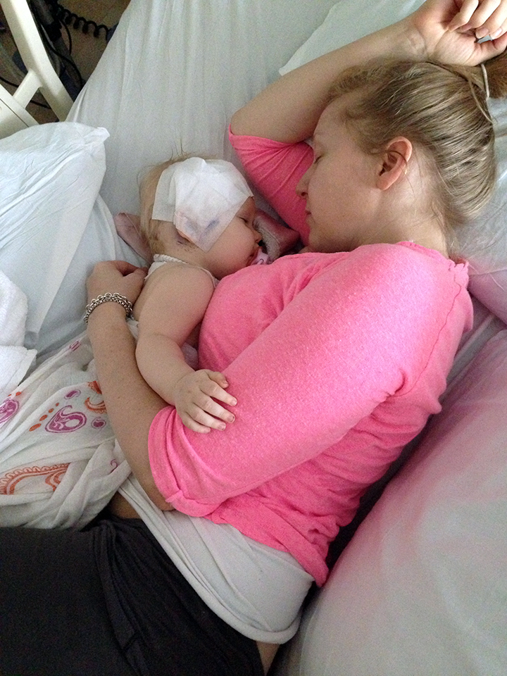 Tracy holding Sophie after her first brain surgery